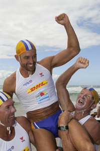 phil clayton hoisterd up by team mates open mens belt photo harvpix.com.jpg